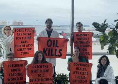Supporters of XR Boston and SR Turtle Island payed a visit to Logan International Airport in Boston, with several messages for the fossil fuel and aviation industries.